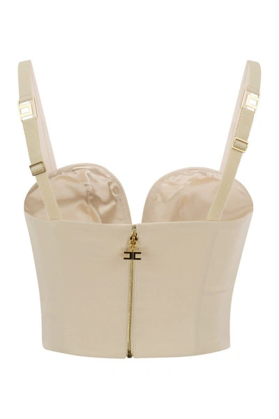 Shop Elisabetta Franchi Stretch Crepe Bustier Top With Enamelled Logo Plaque In Butter