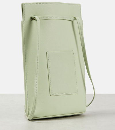 Shop Loewe Dice Pocket Leather Pouch With Strap In Green