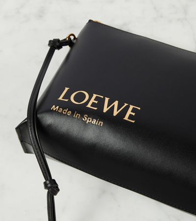 Shop Loewe Logo Embossed Leather Pouch In Black