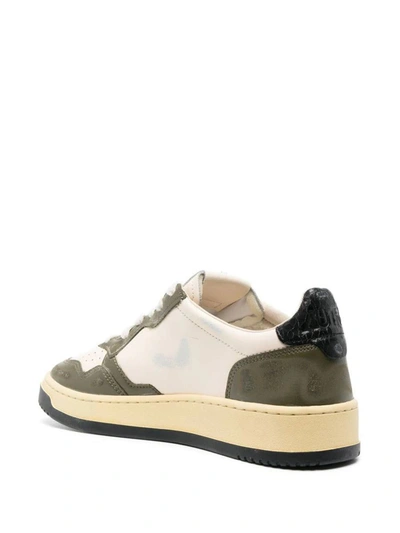 Shop Autry Sneakers In Leat Wht Mil Black