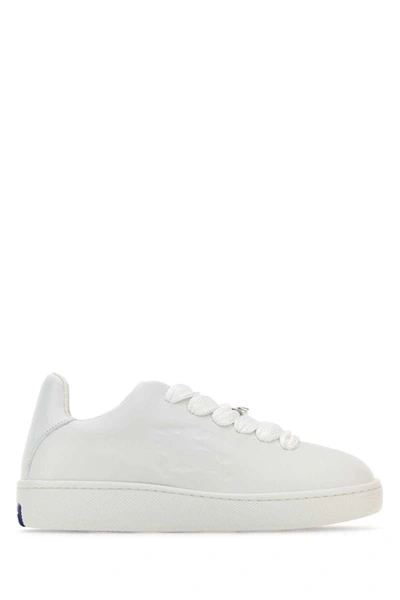 Shop Burberry Sneakers In White