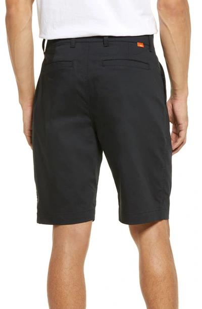 Shop Nike Dri-fit Uv Flat Front Chino Golf Shorts In Black