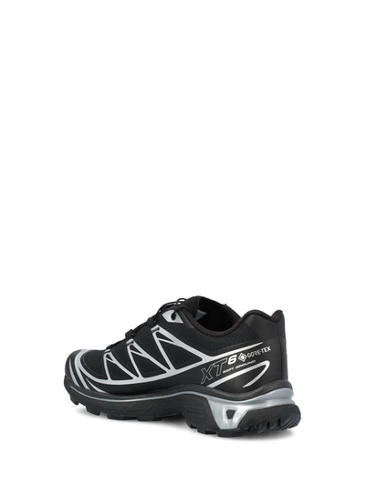 Shop Salomon Sneakers In Black/black/ftw Silver