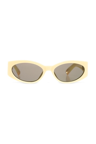 Shop Jacquemus Oval Frame Sunglasses In Yellow