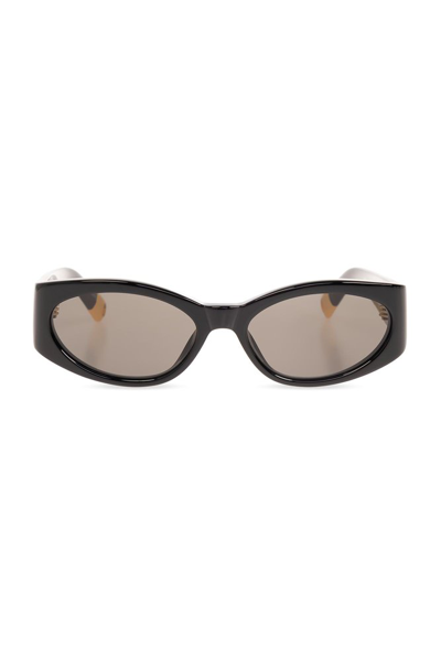 Shop Jacquemus Oval Frame Sunglasses In Black