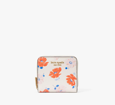 Shop Kate Spade Morgan Dotty Floral Embossed Small Compact Wallet In White