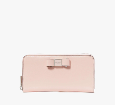 Shop Kate Spade Morgan Bow Embellished Patent Leather Zip-around Wallet In Crepe Pink