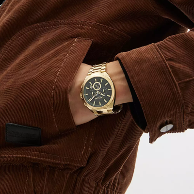 Coach In Gold