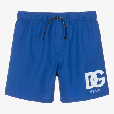 Shop Dolce & Gabbana Teen Boys Blue Dg Swim Shorts