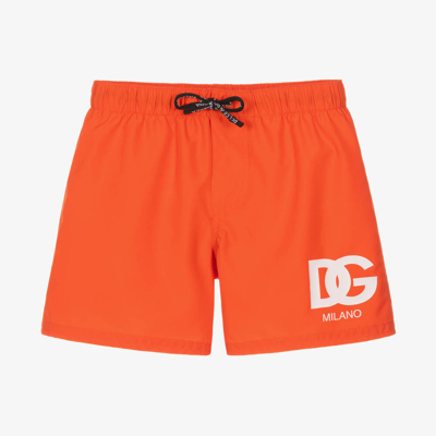 Shop Dolce & Gabbana Boys Orange Dg Swim Shorts