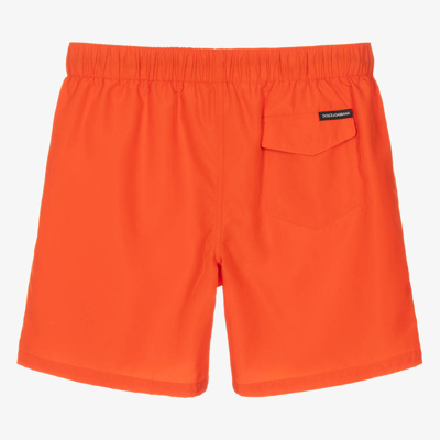 Shop Dolce & Gabbana Teen Boys Orange Dg Swim Shorts