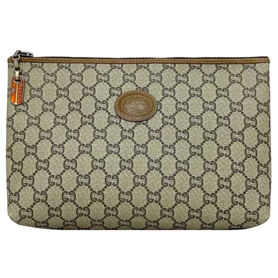 Shop Gucci Gg Plus Beige Canvas Clutch Bag ()