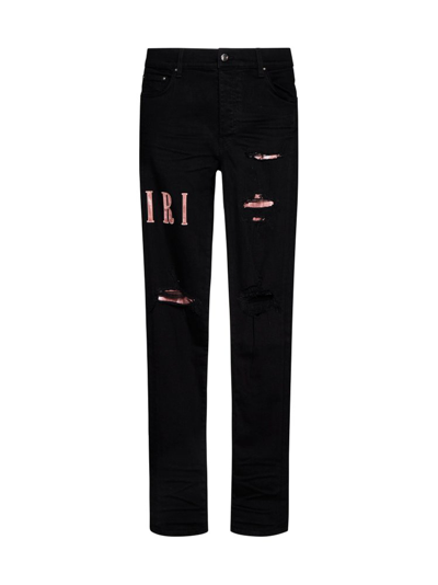 Shop Amiri Logo Patch Distressed Skinny Jeans In Black