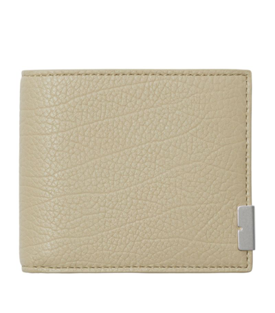Shop Burberry Grained Leather Bifold Wallet In Neutrals
