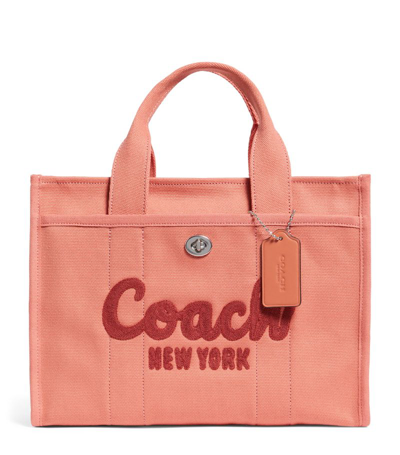 Shop Coach Canvas Cargo Tote Bag In Pink