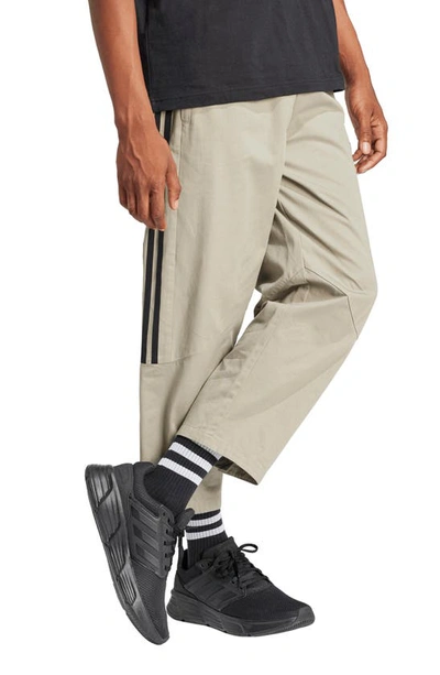 Shop Adidas Originals Tiro Crop Woven Pants In Silver Pebble