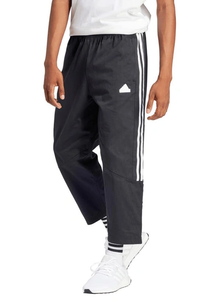 Shop Adidas Originals Tiro Crop Woven Pants In Black