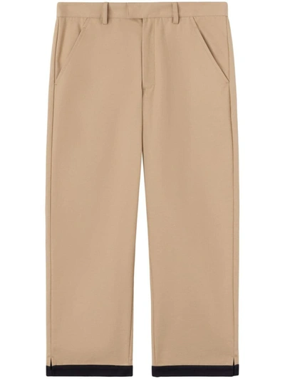 Shop Palm Angels Cuff Detail Trousers In Beige