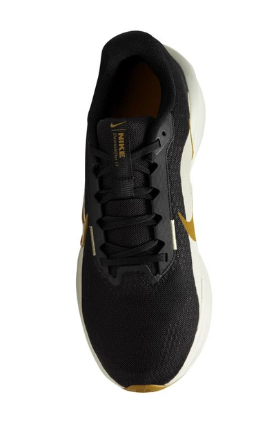 Shop Nike Downshifter 13 Running Shoe In Black/ Bronzine/ Sea Glass