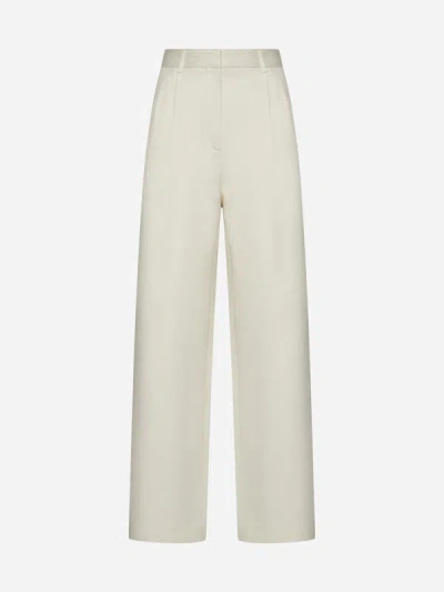 Shop Loulou Studio Idai Cotton And Linen Trousers In Forest Ivory