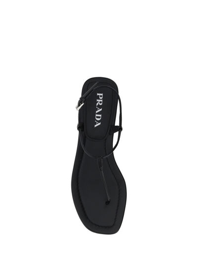Shop Prada Thong Sandals In Nero