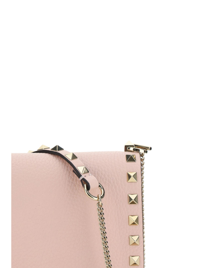 Shop Valentino Garavani Rockstud Handbag In Rose Quartz