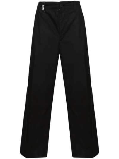Shop Versace Jeans Couture Rx Patch Logo Trousers In Black