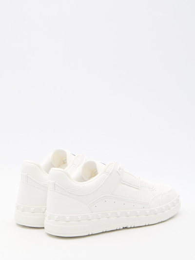 Shop Valentino Freedots Low Top Sneakers In White