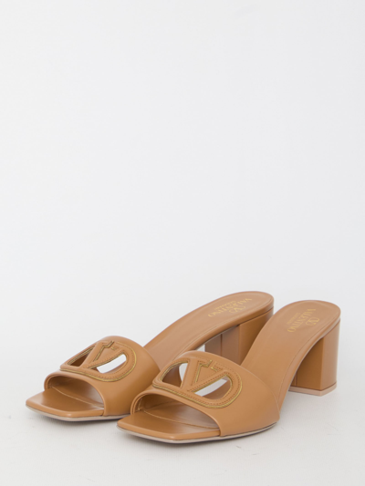 Shop Valentino Slide Vlogo Signature Sandals In Brown
