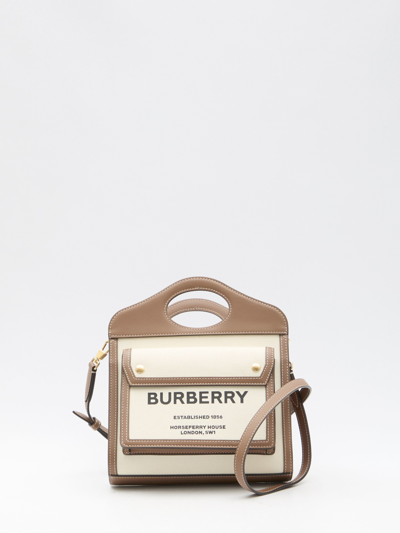 Shop Burberry Pocket Mini Bag In Cream