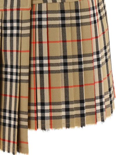 Shop Burberry Pleated Check Wool Mini Kilt In Beige