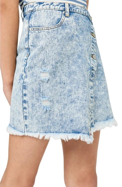 Shop Hayden Girls Kids' Asymmetrical Wrap Distressed Cotton Denim Skirt In Light Denim