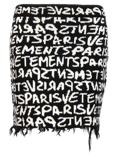 Shop Vetements Graffiti Monogram Skirts In White/black