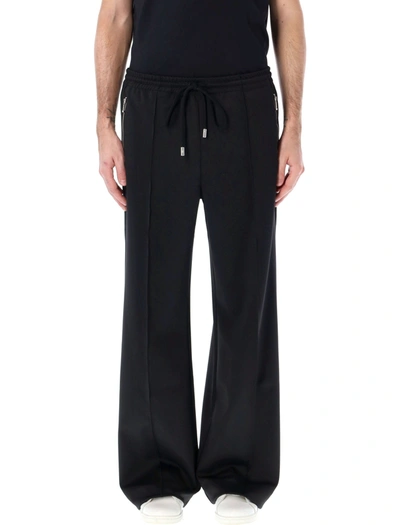 Shop Jw Anderson J.w. Anderson Trackpant In Black