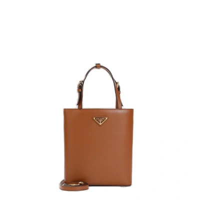 Shop Prada Logo Plaque Top Handle Shoulder Bag In Cammello