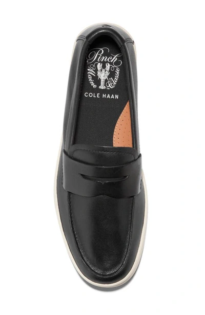 Shop Cole Haan Pinch Weekend Penny Loafer In Black/ Angora