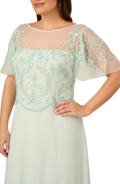 Shop Adrianna Papell Beaded Flutter Sleeve Chiffon Gown In Mint Glass
