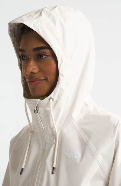 Shop The North Face Antora Waterproof Rain Jacket In White Dune