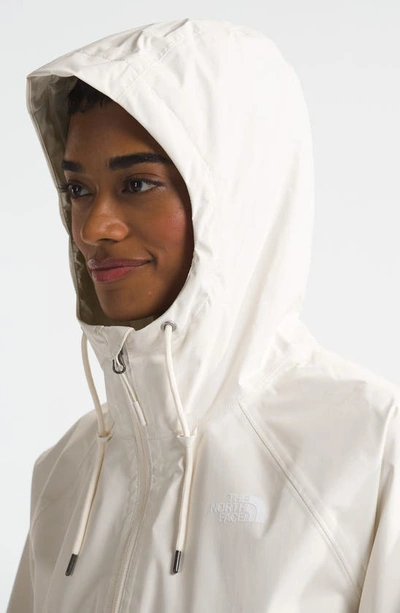 The North Face Antora Waterproof Rain Jacket In White Dune