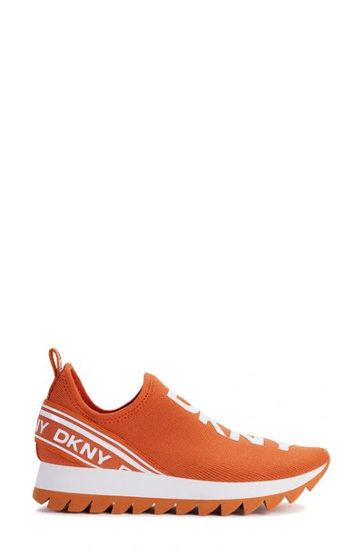 Shop Dkny Slip-on Sneaker In Spicy Orange