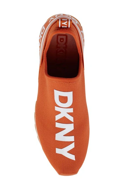 Shop Dkny Slip-on Sneaker In Spicy Orange