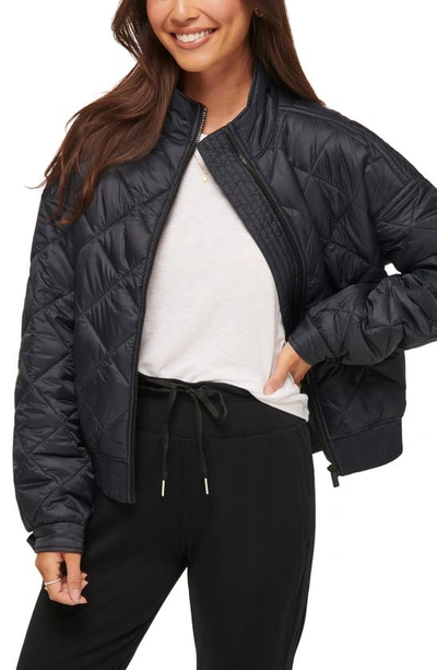 Travis Mathew Lights At Night Quilted Jacket In Obsidian