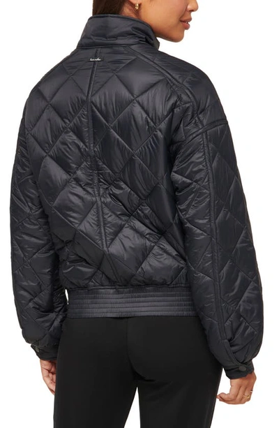 Travis Mathew Lights At Night Quilted Jacket In Obsidian