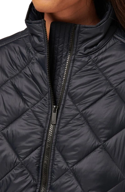 Travis Mathew Lights At Night Quilted Jacket In Obsidian