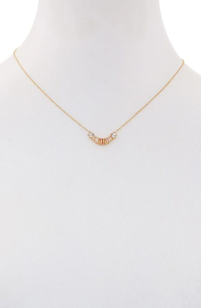 Shop Vince Camuto Baguette Crystal Pendant Necklace In Gold