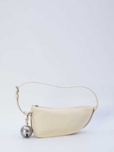 Shop Burberry Mini Shield Sling Bag In Pearl