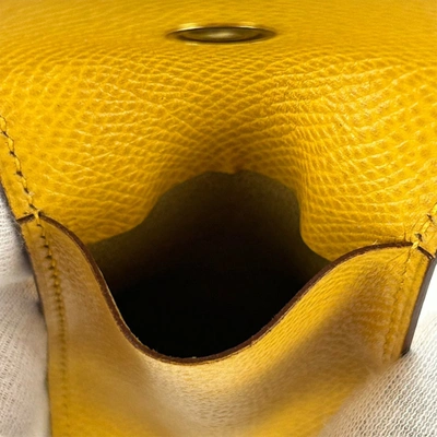 Shop Hermes Hermès Yellow Leather Clutch Bag ()