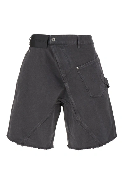 Shop Jw Anderson J.w. Anderson Asymmetric-waist Fringed-edge Bermuda Shorts In Grey