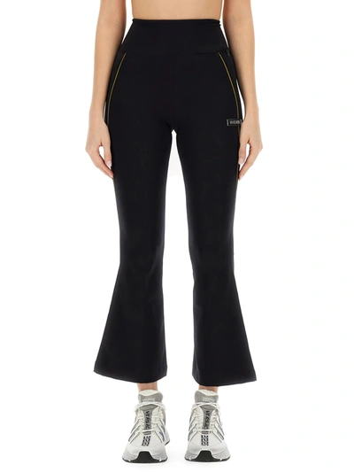 Shop Versace Pants With Logo In Nero