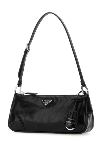 Shop Prada Handbags. In Black